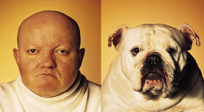 Another man with a look-a-like dog
